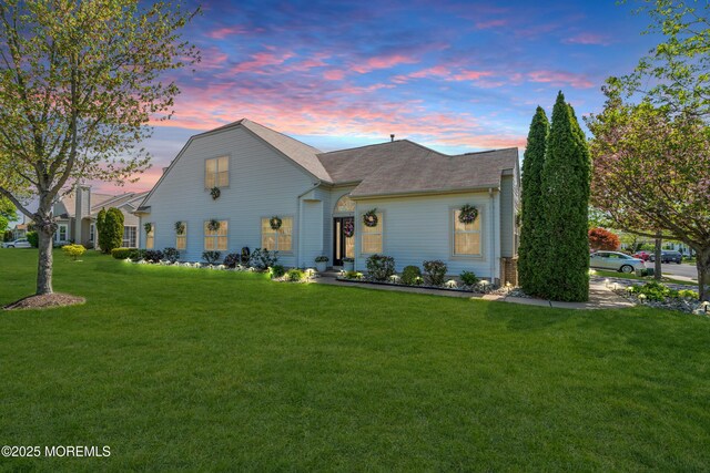 view of front of house with a front lawn