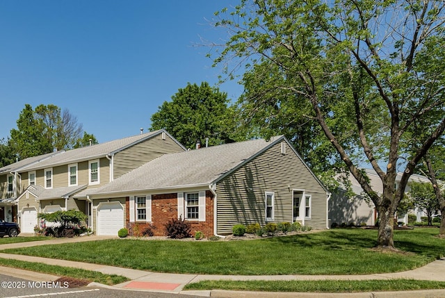 90 Oak Ln, Eatontown, NJ 07724 - view of front facade with a garage, brick siding, a front yard, driveway, and a shingled roof