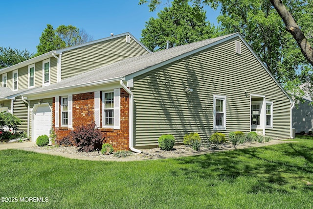 90 Oak Ln, Eatontown, NJ 07724 - view of property exterior featuring a yard and brick siding