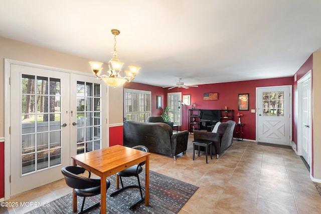 436A New Castle Ct, Manchester, NJ 08759 - dining room featuring light tile patterned floors, french doors, and ceiling fan with notable chandelier
