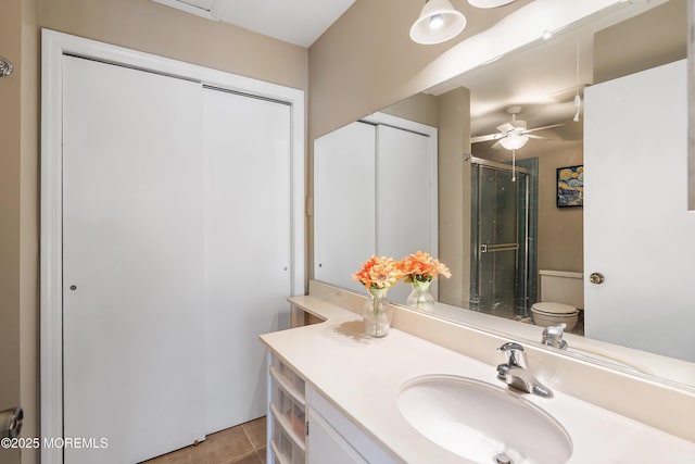 436A New Castle Ct, Manchester, NJ 08759 - bathroom with vanity, a shower with door, ceiling fan, and tile patterned floors