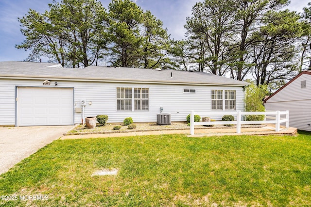 436A New Castle Ct, Manchester, NJ 08759 - back of house with a lawn, fence, driveway, and a garage