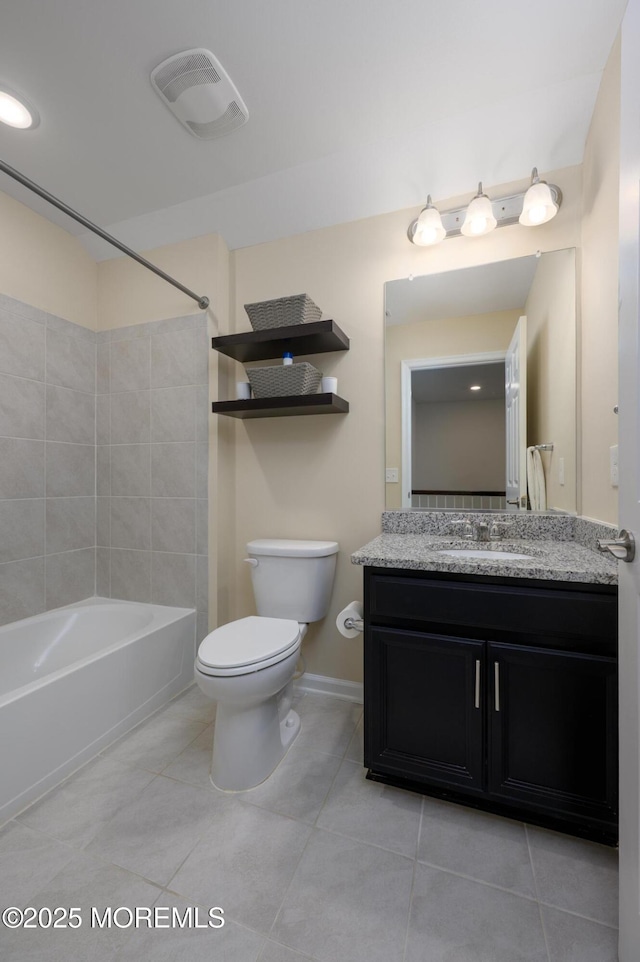 bathroom with tile patterned flooring, visible vents, toilet, and vanity