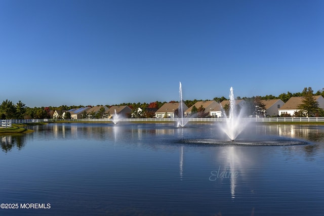 property view of water with a residential view