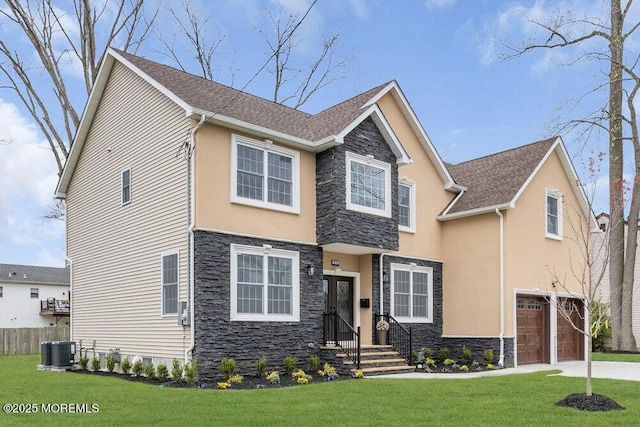 view of front of home with central air condition unit, a garage, stone siding, and stucco siding