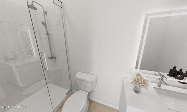 3 5th Ave Unit 206, Neptune City, NJ 07753 - full bathroom with vanity, baseboards, a shower stall, and toilet