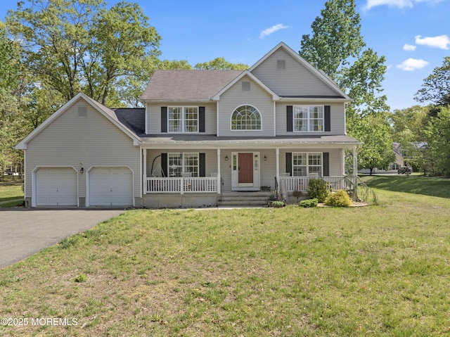 649 Toms River Rd, Jackson, NJ 08527 - view of front facade featuring asphalt driveway, a garage, a porch, and a front lawn