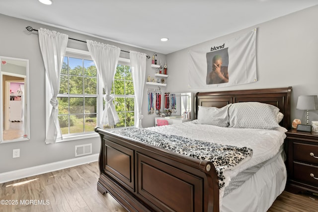649 Toms River Rd, Jackson, NJ 08527 - bedroom with multiple windows, light wood finished floors, baseboards, and recessed lighting