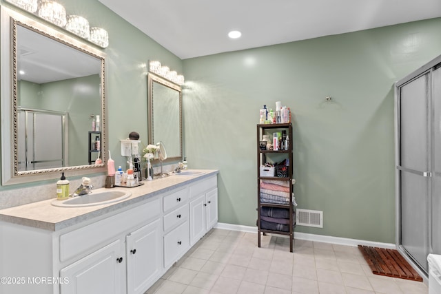 649 Toms River Rd, Jackson, NJ 08527 - full bathroom featuring a stall shower, double vanity, tile patterned floors, and baseboards