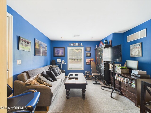 living area with carpet