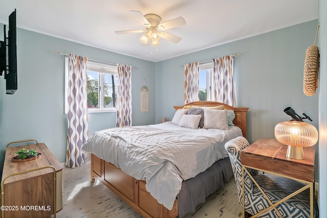 bedroom with a ceiling fan and light floors