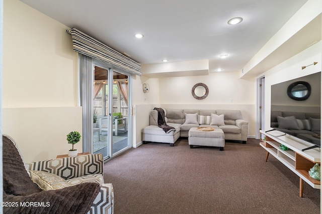 carpeted living room with recessed lighting and baseboards