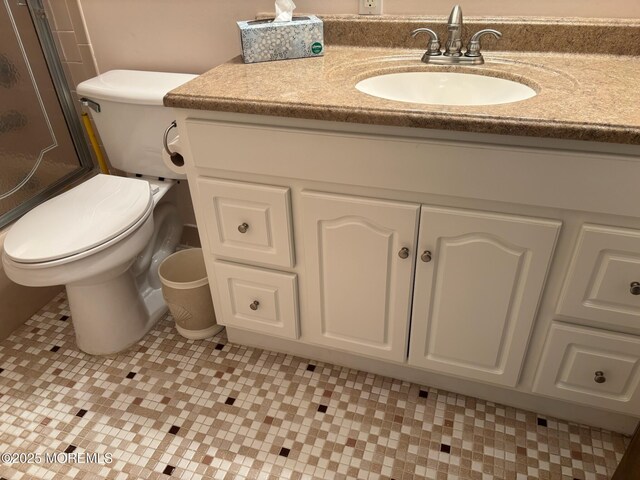 410 Highland Dr Unit A, Whiting, NJ 08759 - bathroom with an enclosed shower, vanity, tile patterned floors, and toilet