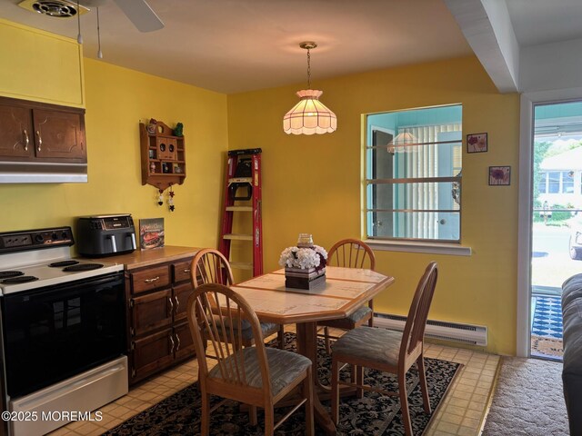 410 Highland Dr Unit A, Whiting, NJ 08759 - dining room featuring a ceiling fan and baseboard heating