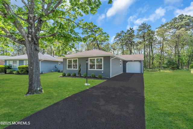 6 Reef Pl, Brick, NJ 08723 - view of front of property featuring a garage, asphalt driveway, and a front yard