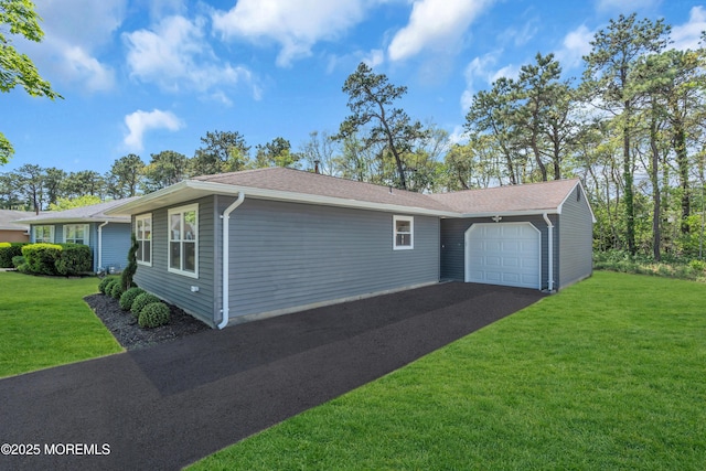 6 Reef Pl, Brick, NJ 08723 - view of home's exterior featuring driveway, an attached garage, a lawn, and roof with shingles
