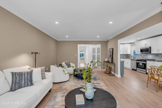 6 Reef Pl, Brick, NJ 08723 - living room with light wood-style flooring, recessed lighting, ornamental molding, and baseboards
