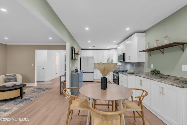 6 Reef Pl, Brick, NJ 08723 - dining room with light wood-style flooring, recessed lighting, and baseboards