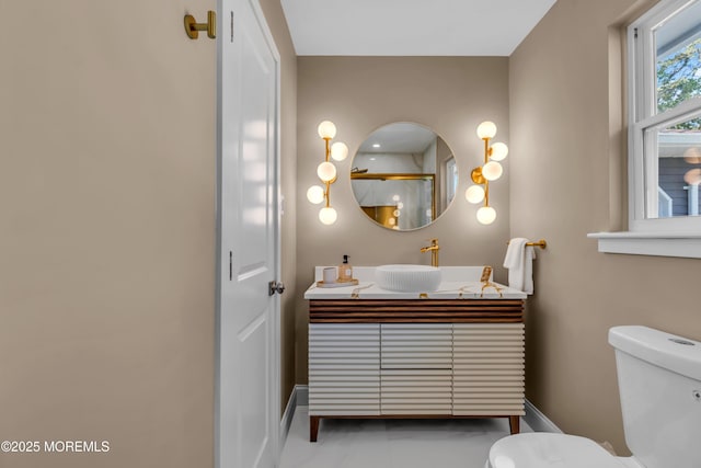 6 Reef Pl, Brick, NJ 08723 - bathroom featuring toilet, vanity, and baseboards