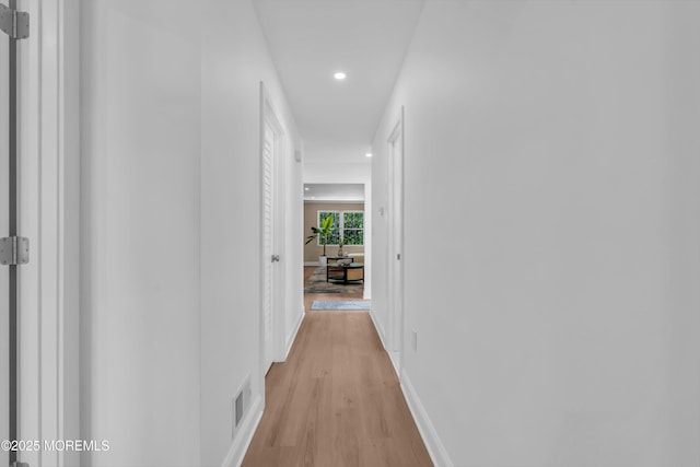 6 Reef Pl, Brick, NJ 08723 - hall with recessed lighting, light wood-style floors, and baseboards