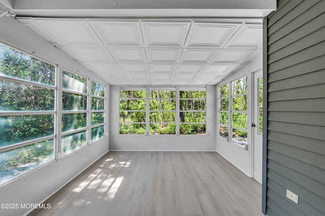 6 Reef Pl, Brick, NJ 08723 - unfurnished sunroom with an ornate ceiling, wood finished floors, and plenty of natural light