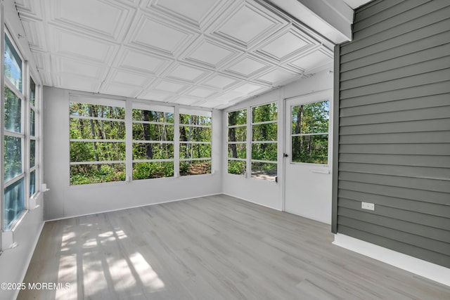 6 Reef Pl, Brick, NJ 08723 - unfurnished sunroom featuring wood finished floors, an ornate ceiling, and healthy amount of natural light