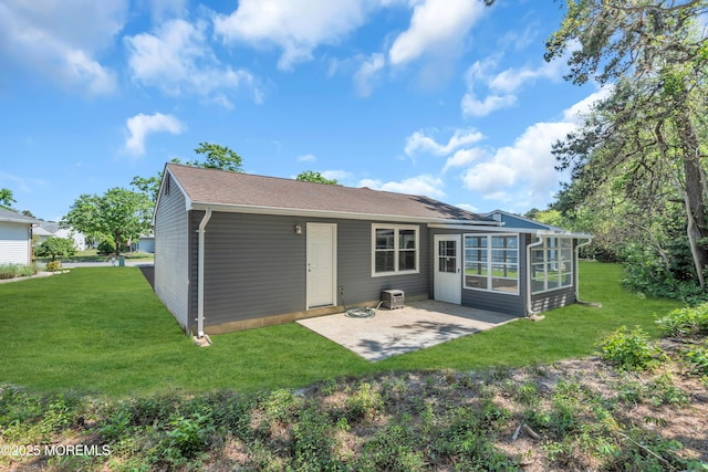 6 Reef Pl, Brick, NJ 08723 - back of house with a patio, a sunroom, a lawn, and a shingled roof