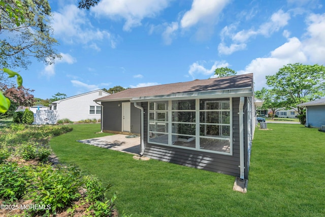 6 Reef Pl, Brick, NJ 08723 - rear view of property featuring a yard and a patio area