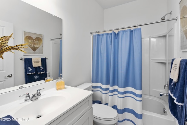 full bathroom featuring toilet, shower / bath combination with curtain, and vanity