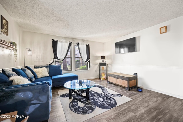 71 Verbena Ct, Jackson, NJ 08527 - living area with baseboards, a textured ceiling, and wood finished floors