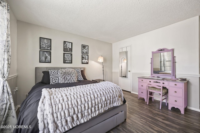 71 Verbena Ct, Jackson, NJ 08527 - bedroom featuring a textured ceiling, dark wood-style floors, and baseboards