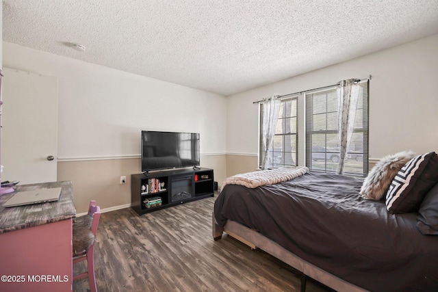 71 Verbena Ct, Jackson, NJ 08527 - bedroom with baseboards, a textured ceiling, and wood finished floors