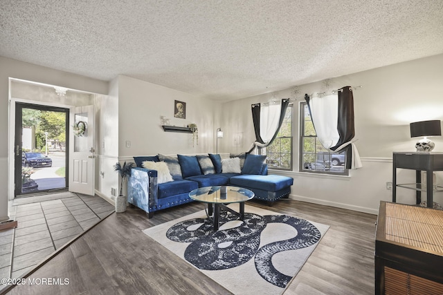 71 Verbena Ct, Jackson, NJ 08527 - living area with a textured ceiling, baseboards, and wood finished floors