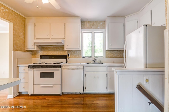 27 Hilltop Rd, West Long Branch, NJ 07764 - kitchen with under cabinet range hood, wood finished floors, a sink, and white appliances