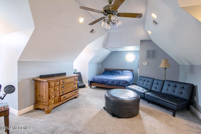 bedroom featuring visible vents, carpet, and lofted ceiling