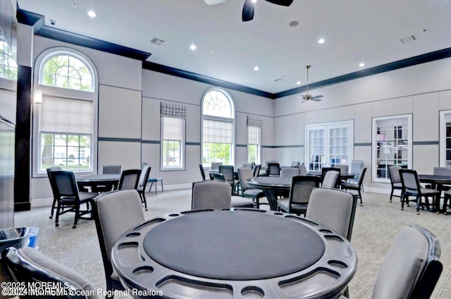 18 Hartack Rd, Manalapan, NJ 07726 - dining area featuring ceiling fan, crown molding, baseboards, a towering ceiling, and recessed lighting