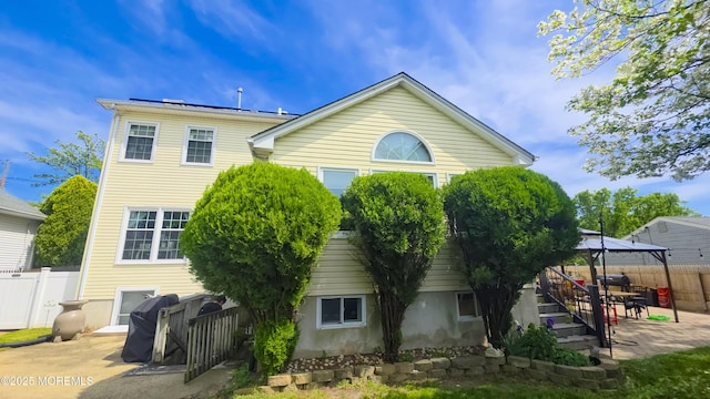 91 Grand Ave, Atlantic Highlands, NJ 07716 - back of house with fence, a patio, and a gazebo