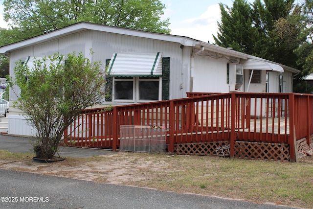 view of front of property with a deck