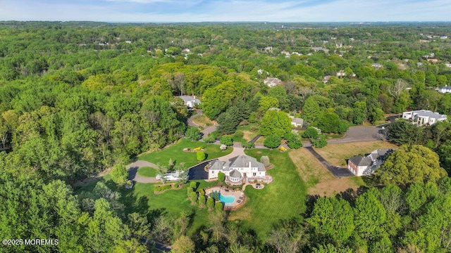 drone / aerial view with a forest view