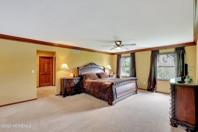 bedroom featuring light carpet, crown molding, baseboards, and a ceiling fan