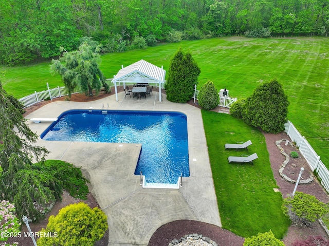 view of pool featuring a gazebo, a patio area, a diving board, and outdoor dining space