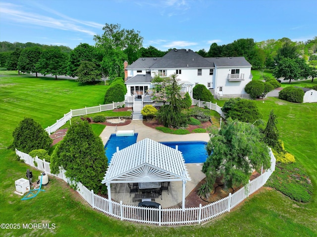 back of property with stairway, a patio, view of scattered trees, and a wall mounted air conditioner