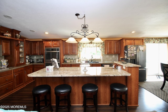 397 Finch Way, Freehold, NJ 07728 - kitchen with a center island, stainless steel appliances, dark wood finished floors, backsplash, and recessed lighting