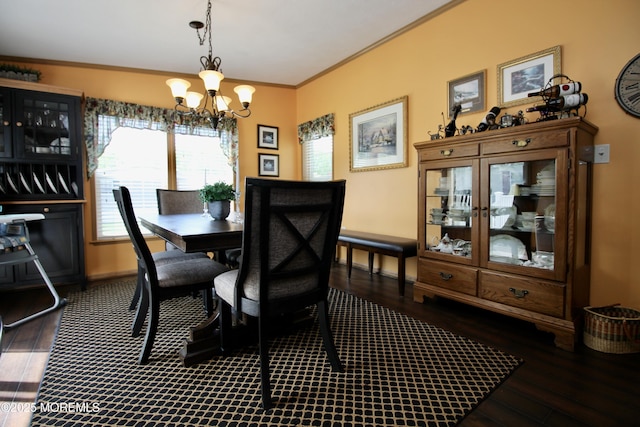 397 Finch Way, Freehold, NJ 07728 - dining room featuring wood finished floors, a chandelier, baseboards, and crown molding