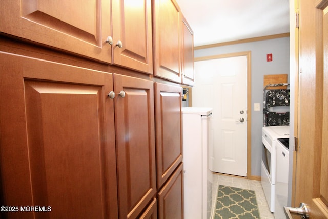 397 Finch Way, Freehold, NJ 07728 - washroom featuring independent washer and dryer, light tile patterned floors, cabinet space, and ornamental molding