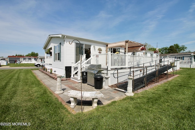 397 Finch Way, Freehold, NJ 07728 - view of side of property with a wooden deck and a yard