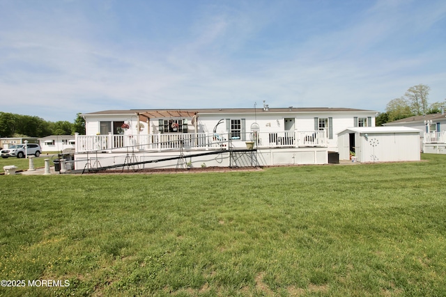 397 Finch Way, Freehold, NJ 07728 - back of property with a lawn