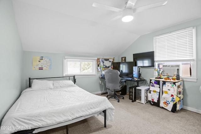 bedroom with lofted ceiling, a ceiling fan, carpet, baseboards, and cooling unit