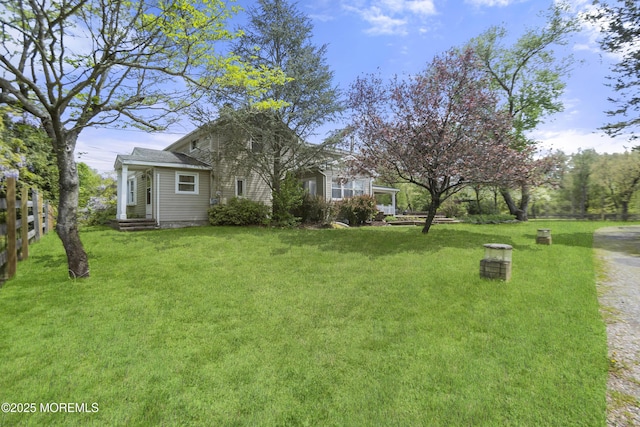 view of yard featuring fence