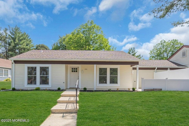 829A Westminster Ct, Manchester, NJ 08759 - ranch-style home with fence, roof with shingles, and a front lawn